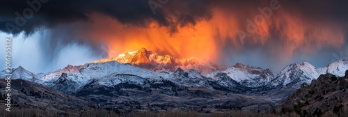  A towering mountain, blanketed in snow, stands beneath an orb bearing orange and yellow hues Smoke substantially billows from its peak photo