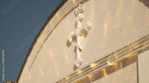 Orthodox church with a cross against the blue sky. Christian temple in spring