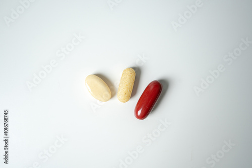 Assorted Medicine and Supplements on Clean White Surface