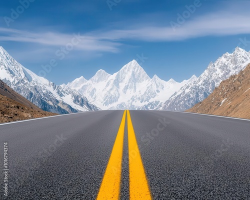 Karakoram Highway stretching towards the horizon, with towering peaks framing the road, Endless Karakoram, Vast, scenic, majestic photo