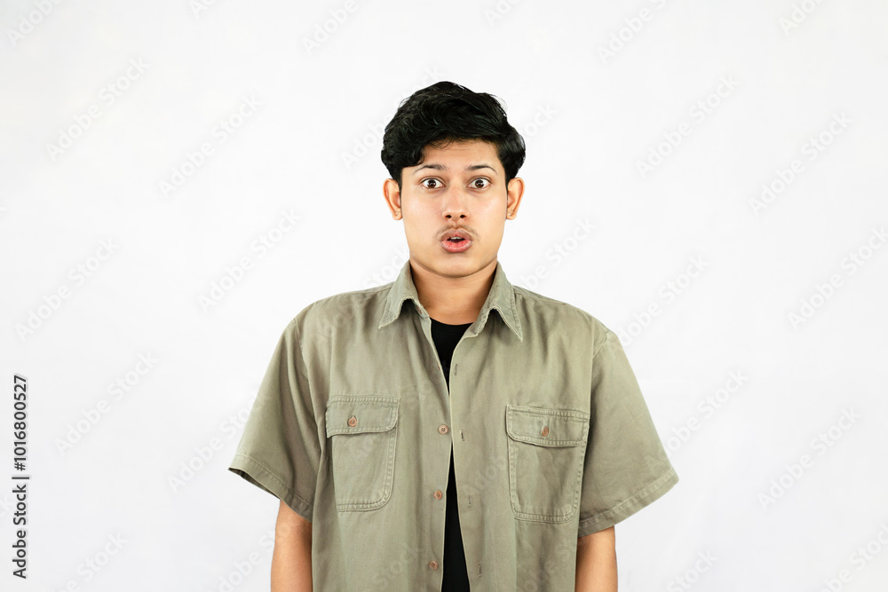 Surprised Young Asian Male Gives wow surporised expression and gestures Surprised Young Asian Male Gives wow surporised expression and gestures