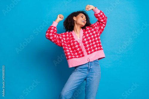 Portrait photo of american beautiful girl with curly hair raised hands up relaxed clubbing drunk isolated on blue color background photo