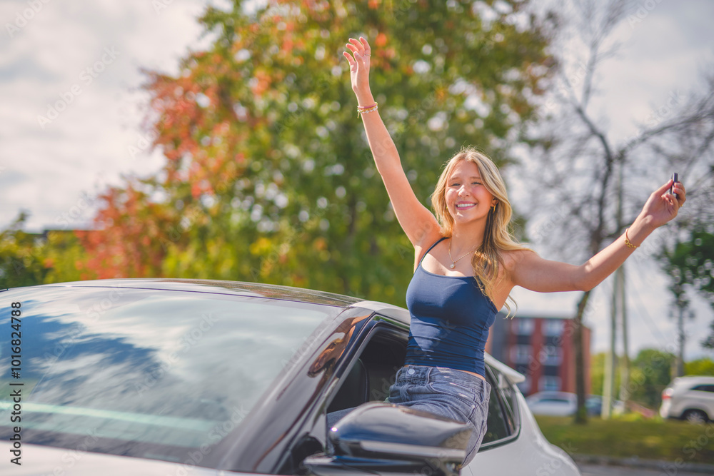 A beautiful woman with her new car sit on door A beautiful woman with her new car sit on door