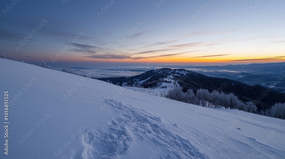 Serene winter twilight envelops the snowy landscape with vibrant golden hues above Serene winter twilight envelops the snowy landscape with vibrant golden hues above
