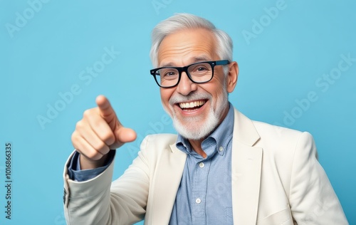 Energetic Elderly Man Pointing with a Smile