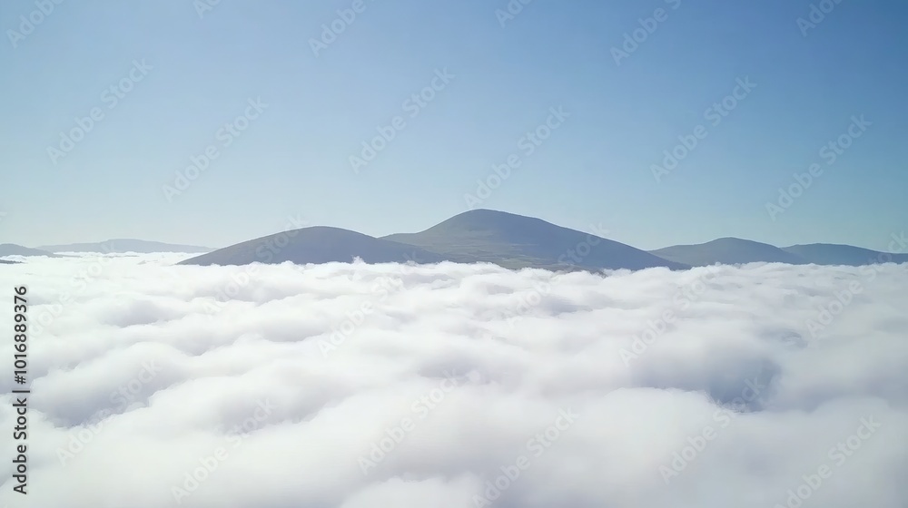 Serene Mountains Above a Sea of Clouds Serene Mountains Above a Sea of Clouds