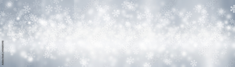 Blurred glitter effects background. Bright soft blue with hints of pearl color. Christmas background. Festive Christmas backdrop with holiday charm. Blurred bokeh light on dark blue background. Christ