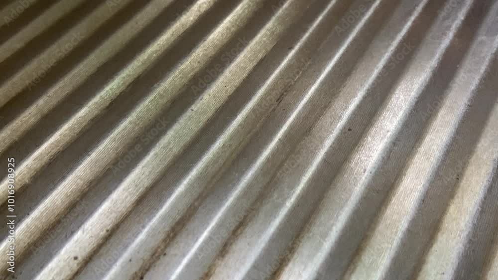 a metal roof  with  streaks of rust