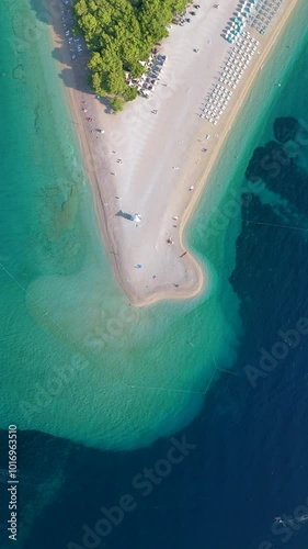 This aerial photograph showcases the stunning Zlatni Rat Beach on Brac Island, Croatia. Its clear waters and unique landform attract visitors and nature lovers, making it a mustvisit spot photo