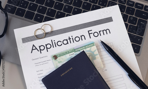 Green card application form and passport for marriage. Application to register permanent residence. Immigration concept	