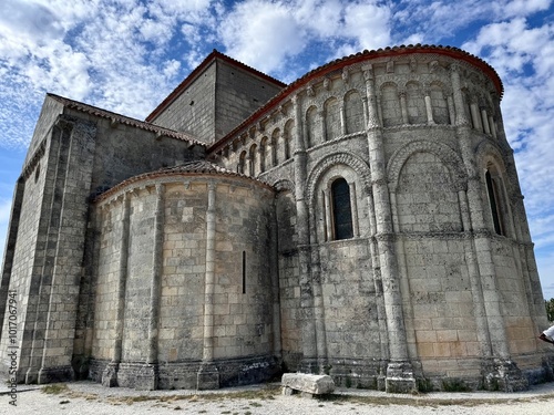 view of the small church of Talmont sur Gironde on a summer day under a cloudy sky
 photo