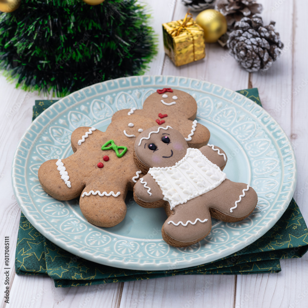 Traditional christmas gingerbread cookies over a wooden table Traditional christmas gingerbread cookies over a wooden table
