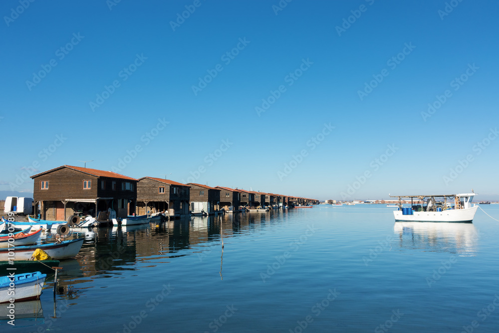 Obraz premium The area at the delta of river Axios in the Thermaic gulf, Thessaloniki, Greece, where there are fishermen's cabins