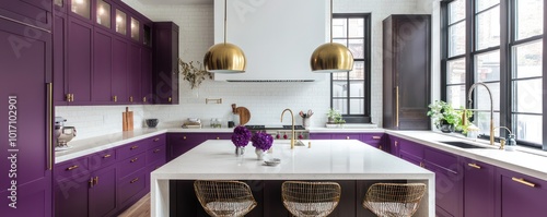 Modern kitchen with violet cabinets, cream limestone countertops, antique brass pendant lights, and dark wood flooring