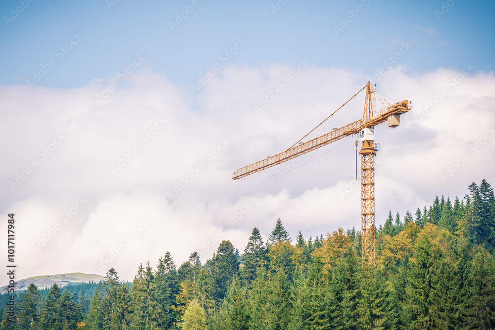 Obraz premium a large yellow construction crane