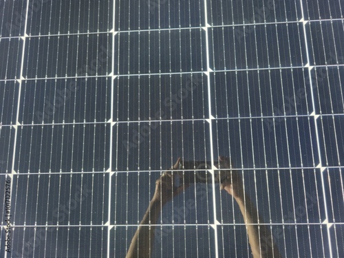 point of view for pearson cleaning PV modules using water and moving out the dusts, middle east areas and deserts areas needs to clean PV modules periodically to maintain energy production
 photo