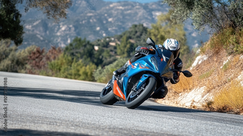 Blue and Orange Sportbike Leans Into a Mountain Curve Blue and Orange Sportbike Leans Into a Mountain Curve