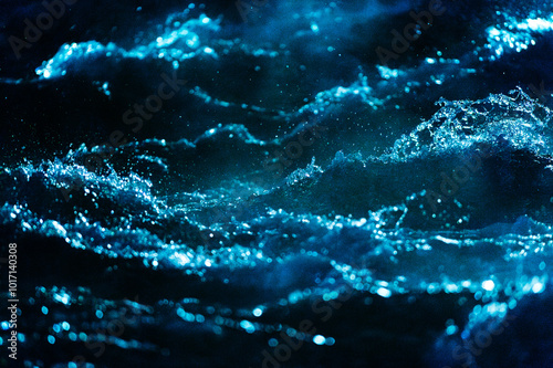 Turbulent waves in water at night, closeup