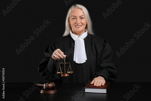 Mature female judge with sc...