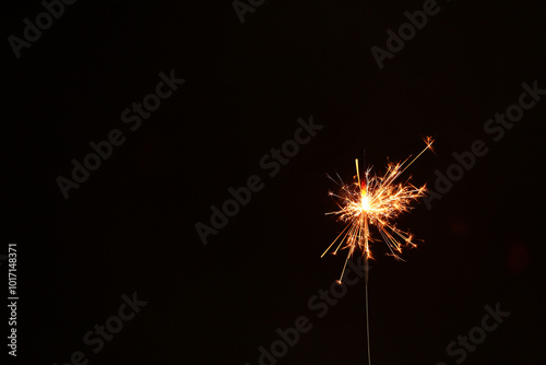 Beautiful Christmas sparkler on black background