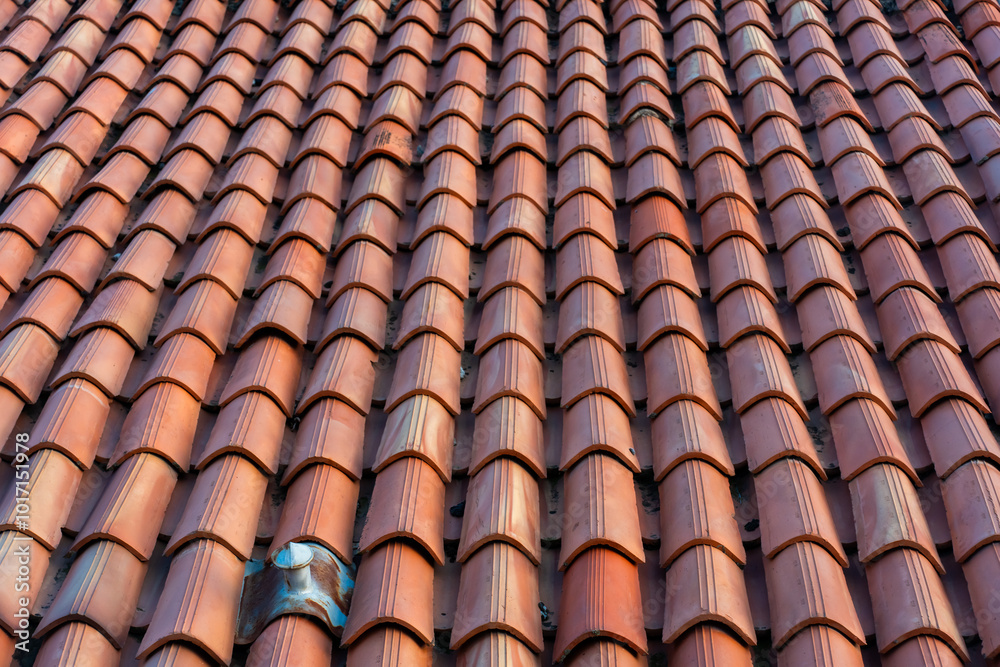 Close up of a terracotta tile roof with textured clay shingles in warm earthy tones. Concept of traditional Mediterranean architecture and durable building materials. High quality photo Close up of a terracotta tile roof with textured clay shingles in warm earthy tones. Concept of traditional Mediterranean architecture and durable building materials. High quality photo