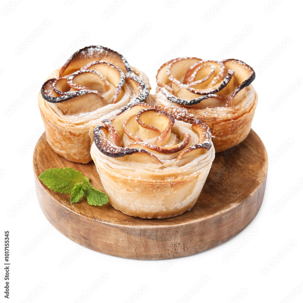 Fototapeta premium Freshly baked apple roses with mint isolated on white