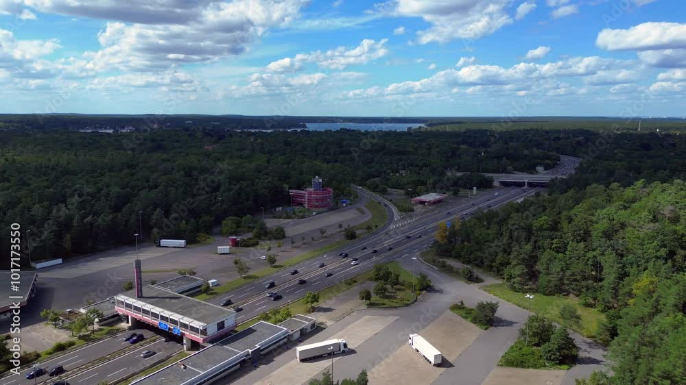 Highway interchange, forest to lake wannsee. Lovely aerial view flight drone Highway interchange, forest to lake wannsee. Lovely aerial view flight drone