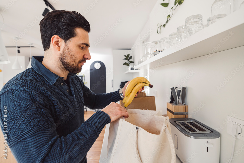 The couple go about their daily chores in the apartment. The couple talks in the kitchen, sits on the sofa, at the dining table. The couple go about their daily chores in the apartment. The couple talks in the kitchen, sits on the sofa, at the dining table.