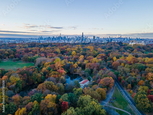 Aerial sunset landscape of Prospect Park in fall with Brooklyn Manhattan skyline New York City