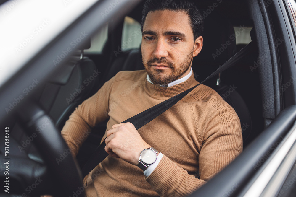 A business man prepares to drive his car around the city A business man prepares to drive his car around the city