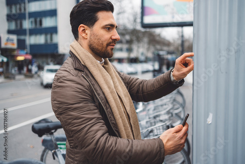 A business man prepares to drive his car around the city