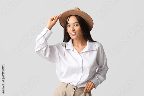Stylish young asian woman p...