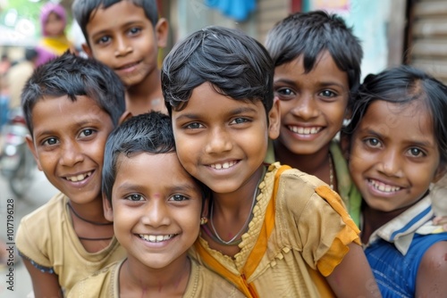 Portrait of a group of indian kids smiling at the camera.