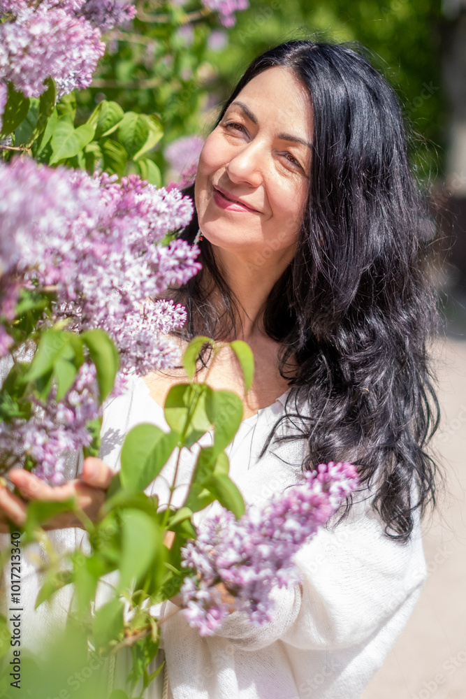 Woman Enjoying Aromatic Lilac Flowers in Bloom, Experiencing Joyful Springtime, Surrounded by Nature, Relaxation and Serenity Outdoors, Blissful Moment Concept Woman Enjoying Aromatic Lilac Flowers in Bloom, Experiencing Joyful Springtime, Surrounded by Nature, Relaxation and Serenity Outdoors, Blissful Moment Concept
