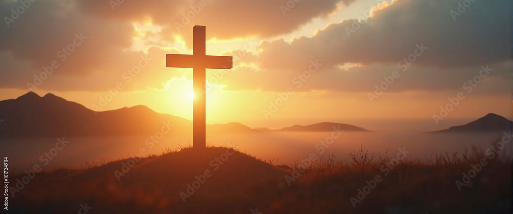 Silhouetted christian cross silhouette on the mountain at sunset Silhouetted christian cross silhouette on the mountain at sunset
