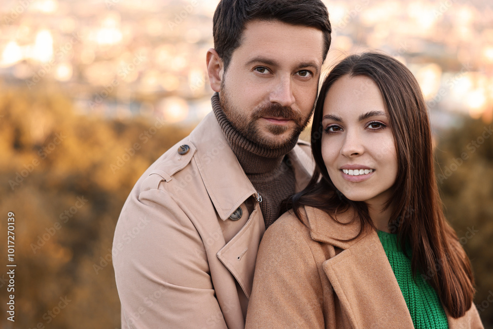 Fototapeta premium Portrait of beautiful couple outdoors on autumn day
