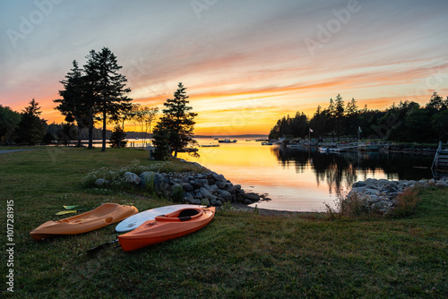 Small boats under the setting sun at Glen Margaret Bay, Nova Scotia