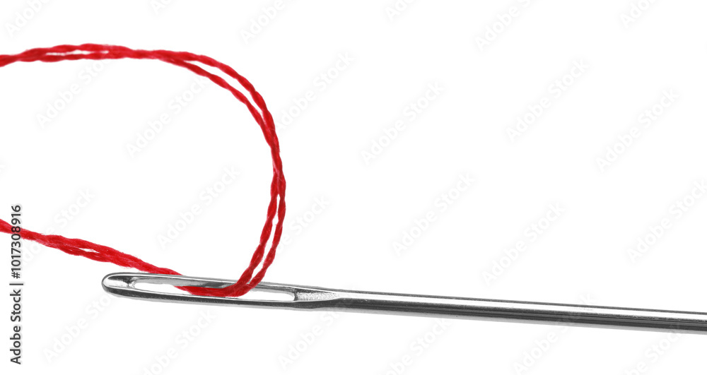 Sewing needle with red thread isolated on white, closeup Sewing needle with red thread isolated on white, closeup