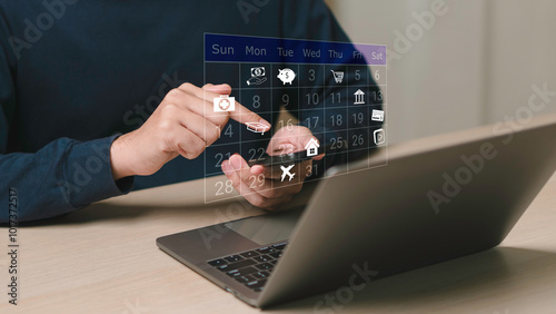 Obraz na płótnie calendar to make management concept , working with note to smartphone and laptop. Managing The Finances Of The Business. Bill Payments, Income And Expense Tracking, Monthly Budget, Savings. w salonie