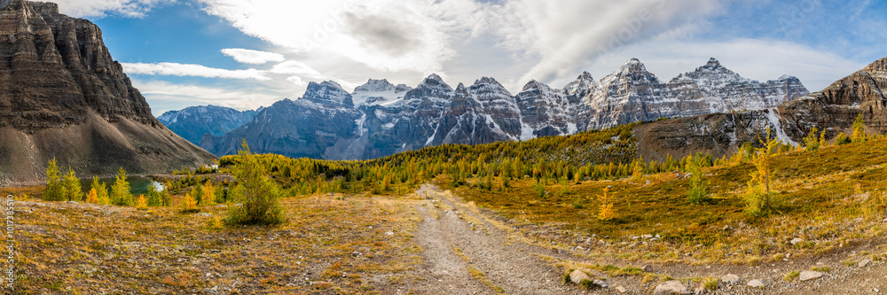 Beautiful fall time scenic views at Sentinal Pass, Larch Valley during September with light snow covering the incredible landscape in northern Canada, Banff National Park. Beautiful fall time scenic views at Sentinal Pass, Larch Valley during September with light snow covering the incredible landscape in northern Canada, Banff National Park.