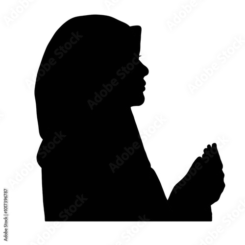 silhouette of a muslim woman praying
