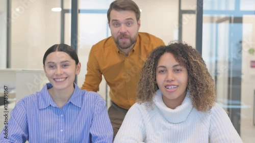 Blogging Multi Ethnic Teammates Doing Video Chat in Office