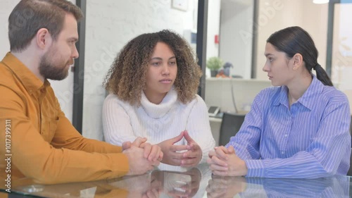 African Woman Talking with Business Partners