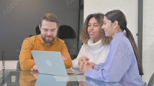 Online Chat by Business People on Laptop at Work