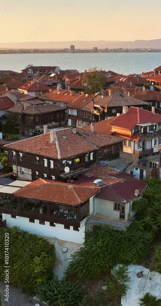 Aerial drone view of the old town Nessebar, Bulgaria at sunset. Vertical Aerial drone view of the old town Nessebar, Bulgaria at sunset. Vertical
