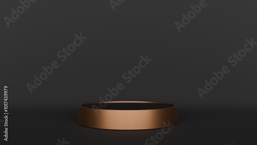 a ring on a black surface with a black background