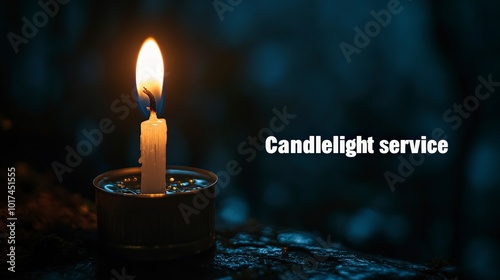 Candle illuminating the dark during a peaceful evening service with reflection