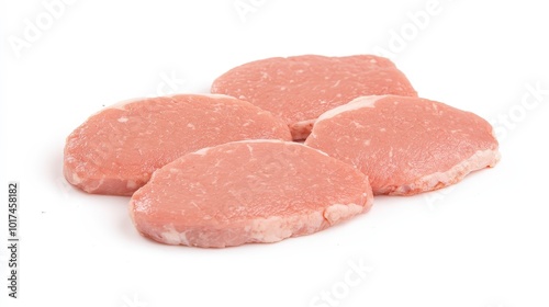 Fresh raw pork cutlets on a white background in a studio setting photo