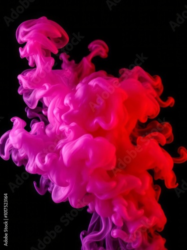 Dense multicolored smoke of red purple and pink colors on a black isolated background background of smoke vape Smoke Explosion Backdrop