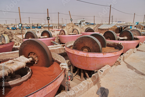 Obraz na płótnie Nouakchott, Mauritania - 06 Jan 2022: Factory next to a gold mine in Sahara desert not far Nouakchott, Mauritania, West Africa w salonie